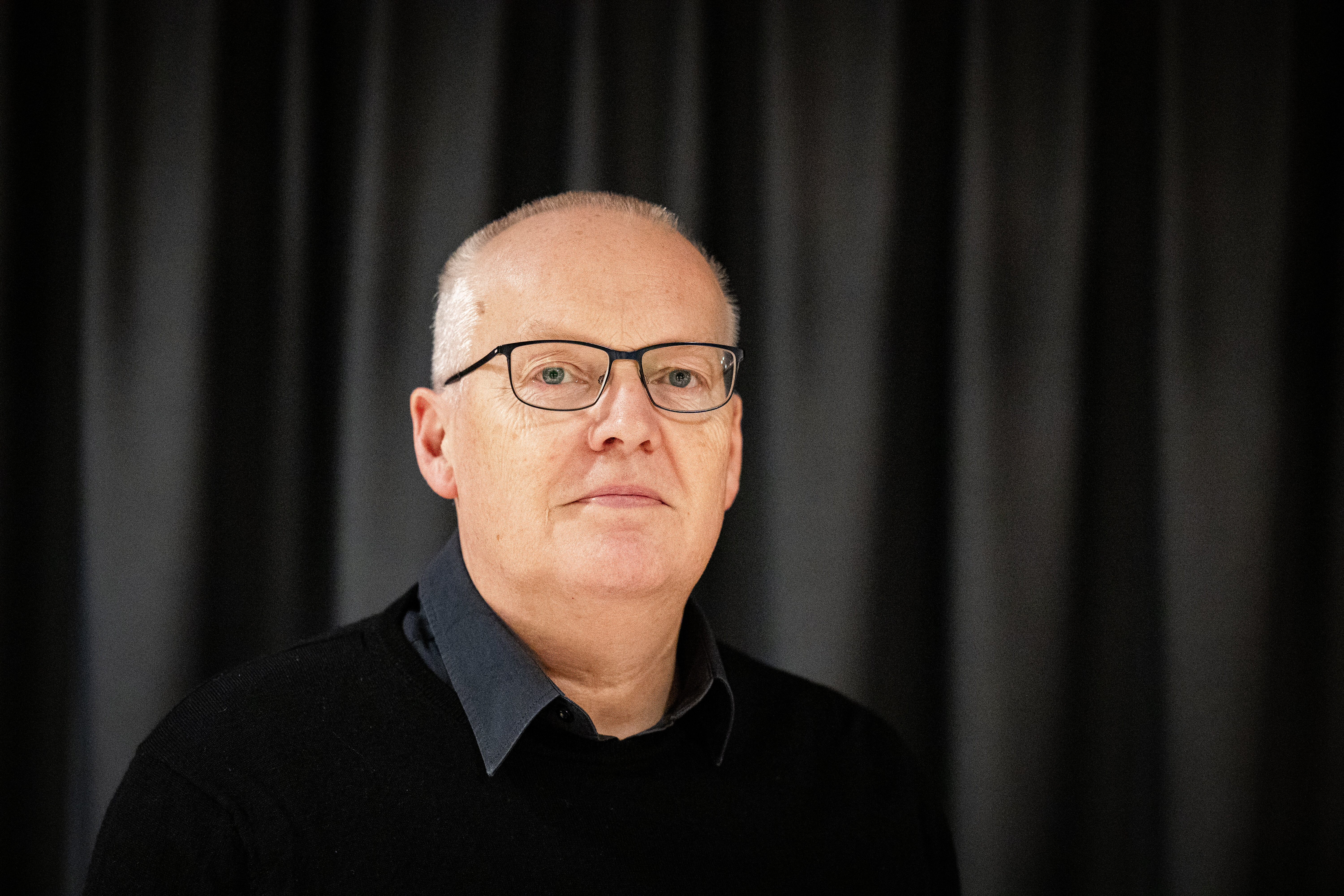 Bildet viser et portrett av Helge Edland