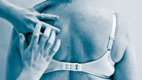 Percussion of lungs The photo shows the back of a woman wearing a bra. A nurse knocks her fingers on the woman's back, listening to her lungs, performing percussion.